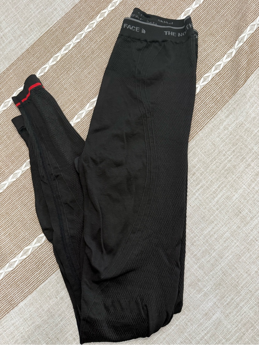 The North Face Black Leggings with Red Cuff Detail